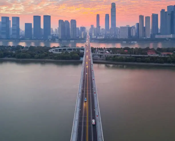 the bridge leads to the central business district, beautiful changsha city in sunrise, hunan province, China