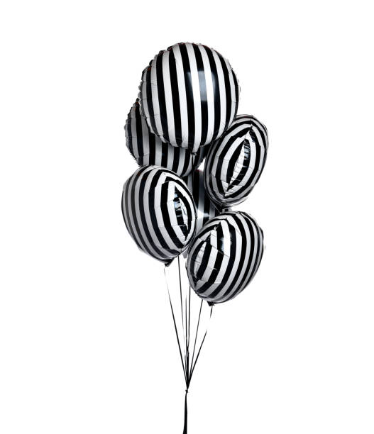 un montón de grandes globos de caramelo de rayas blancas y negras se oponen a la fiesta de cumpleaños aislada en un blanco - balloon pink black anniversary fotografías e imágenes de stock