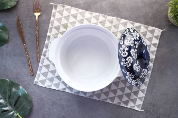 istock cutlery and empty bowl on black background top down 1313400278