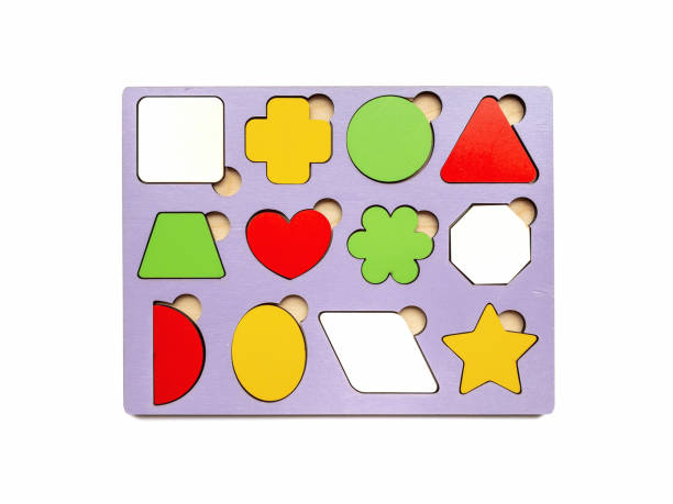 istock The developing toy an insert consisting of geometric figures isolated on white background. Children s development, toys. 1313404498