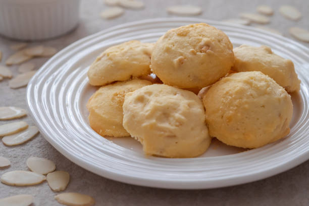istock Butter cookies with almond on white plate 1313406333