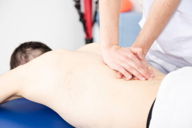 istock Physiotherapist treating a patient 1313411031