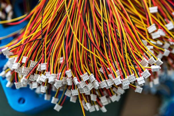 Wiring harnesses, production. Industrial background with copy space. Close-up of a bundle of cut thin wires .The concept of electrical appliances in production and factory. safety harness photos stock pictures, royalty-free photos & images