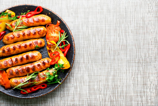 istock Grilled barbecue sausages,copy space 1313418695