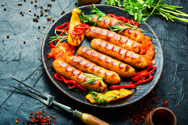 istock Fried sausages and vegetables 1313418956