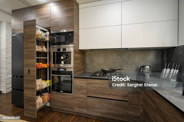 Modern Luxury Large Dark Brown Gray And Black Kitchen Details Stock Photo - Download Image Now