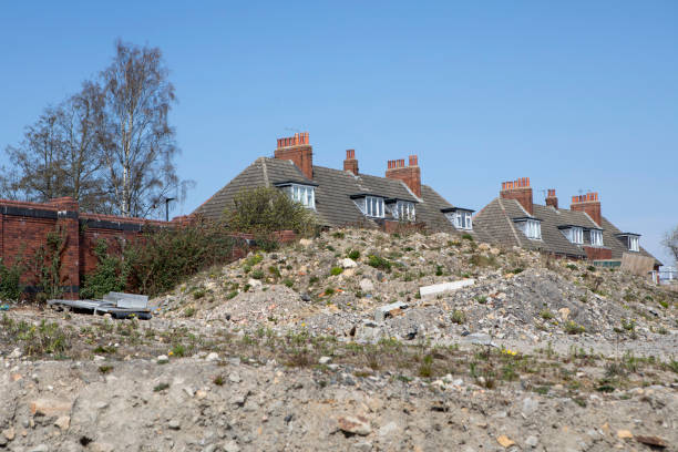 istock City housing against a clear sky with wasteland ready for development in the foregound 1313421764
