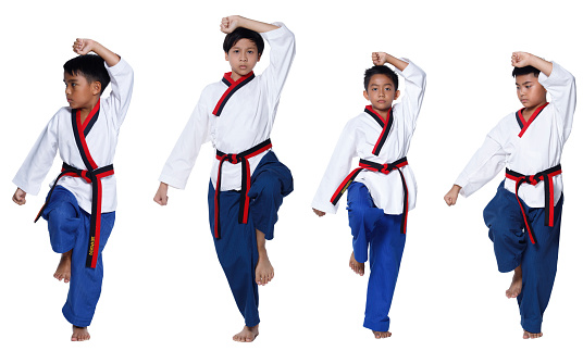 Black Red Belt TaeKwonDo Karate Kid athlete young teenager show traditional Fighting poses high round kick in sport uniform dress, studio lighting white background isolated full length profile