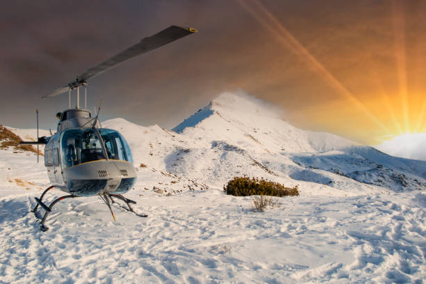 istock Helicopter in the alps at sunset 1313423424