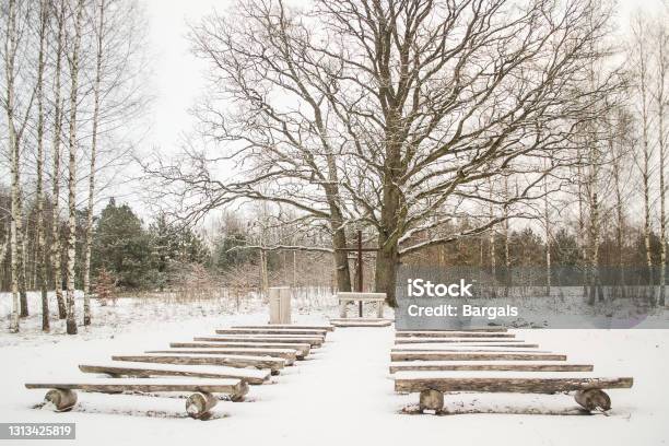 Open Air Church In Winter Stock Photo - Download Image Now - Bench, Black Color, Church