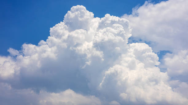 istock Fluffy clouds float in the sky during the day. 1313427285