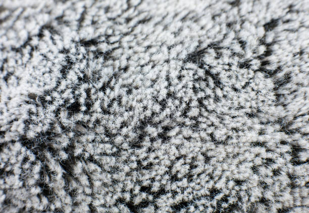 istock Grey cotton towel or carpet fluffy texture background. Close up, macro photo. Soft focus image. 1313427538