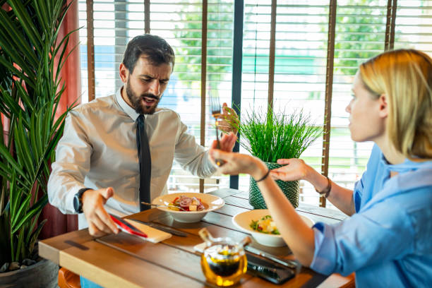 istock Beautiful Fashionable Couple in Love is Going Through Serious Relationship Problems During the Lunch at a Restaurant. 1313428694
