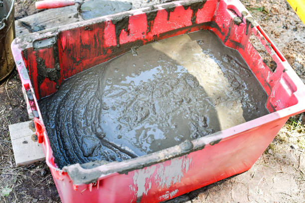 istock Cement mortar in the plastic pallet is prepared for side work. Construction side works 1313428935