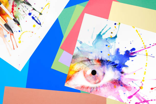 istock painted watercolor eye and multicolored colored paper 1313430092