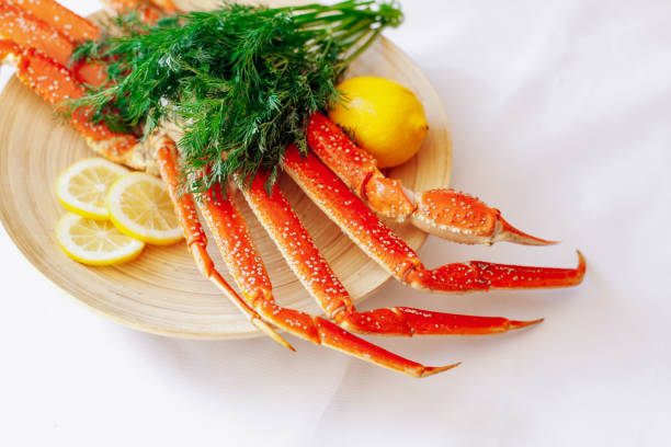 istock Crab, lemon and dill on a plate on a white background. 1313430763