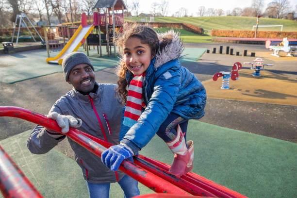 istock Playing on the Jungle Gym With Dad 1313430764