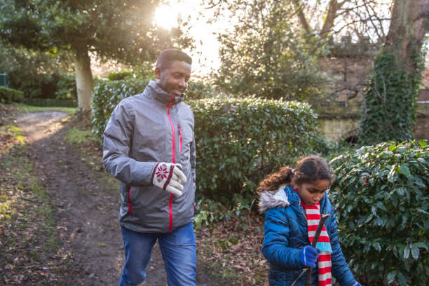 istock Walks in the Woods with my Daughter 1313431554
