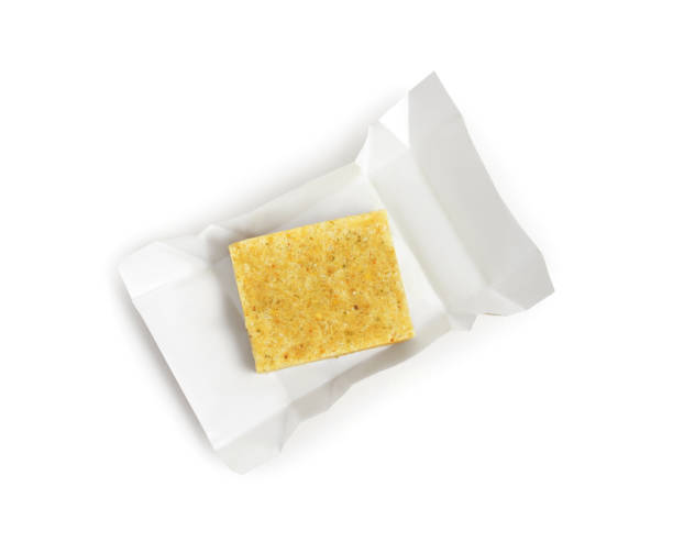 unwrapped bouillon cube on white background, top view - caldo imagens e fotografias de stock