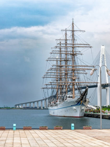 istock Scenery of the harbor with a sailing ship 1313436631