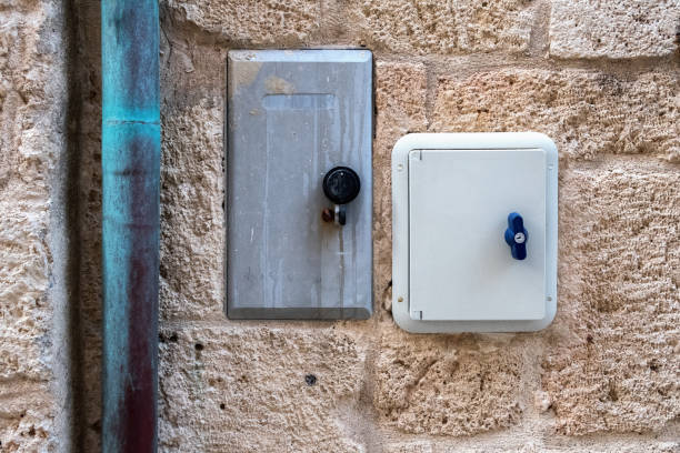 istock Manhole in the wall, technical box in the wall 1313443712