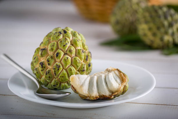 istock Sugar apple on wooden table. 1313446919