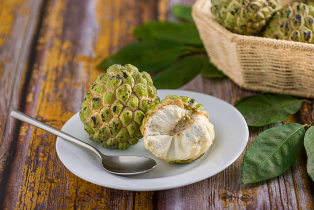 Sugar apple on wooden table.