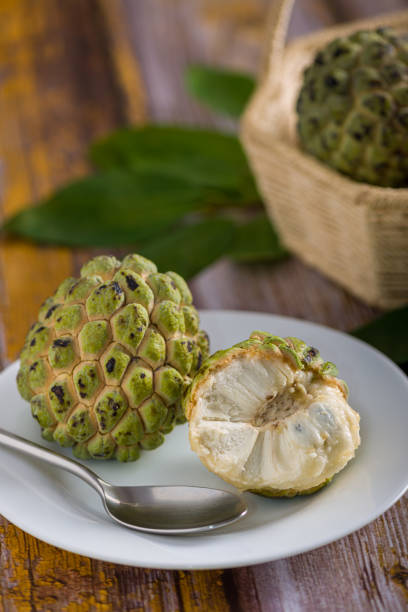 istock Sugar apple on wooden table. 1313446948