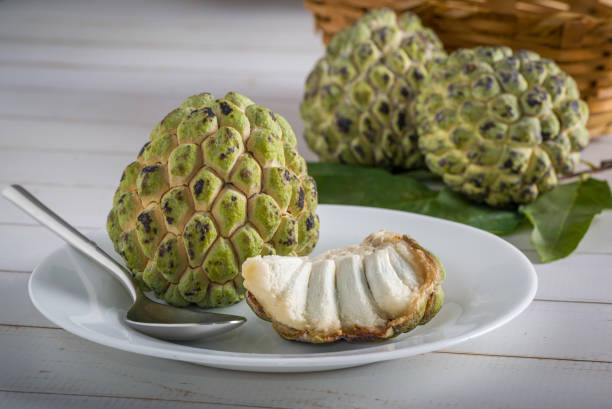 istock Sugar apple on wooden table. 1313446964