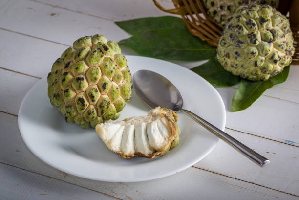 istock Sugar apple on wooden table. 1313446985