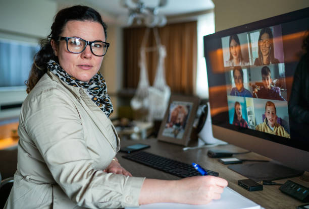 istock Schoolchildren in video call at online class 1313449209