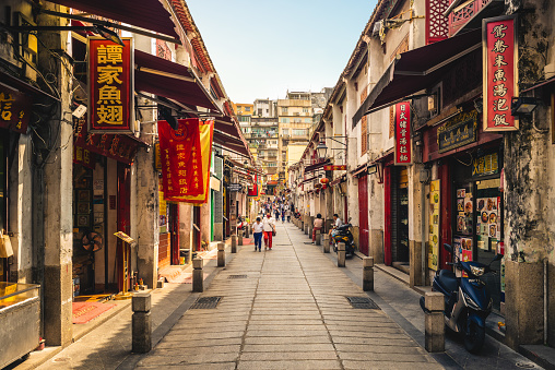 October 10, 2019: Rua da Felicidade, aka Happiness street, was once the heart of red light district of Macau, China. Now it is one of the most popular streets with local delicacies and souvenirs