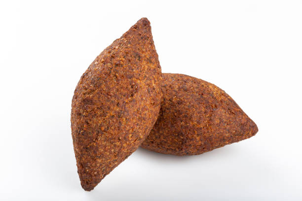 istock Roasted kibe, traditional Brazilian snack on white background. 1313451102