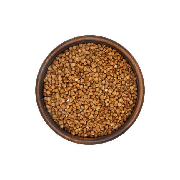 istock buckwheat grain in clay bowl isolated on white background, top view 1313452238