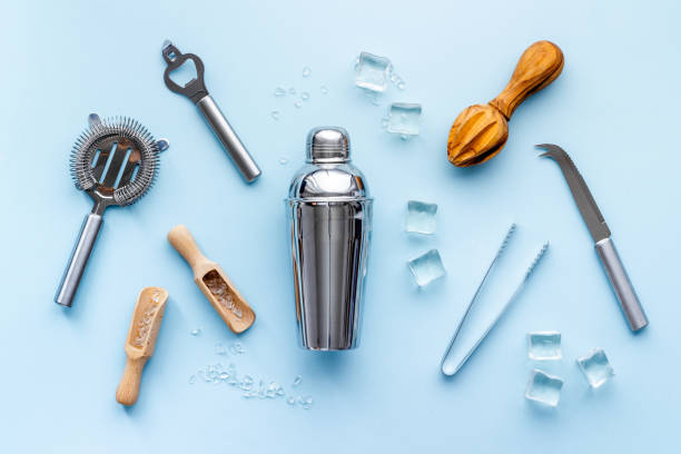 istock Barman equipment tools and cocktail ingredietns, top view 1313453363