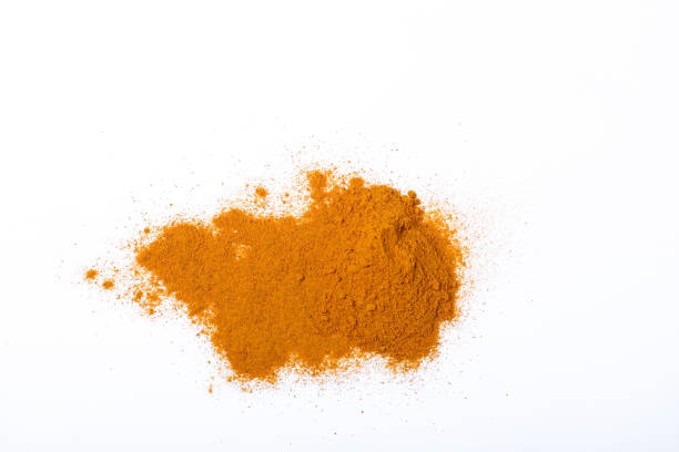 istock Turmeric powder on black background 1313453817