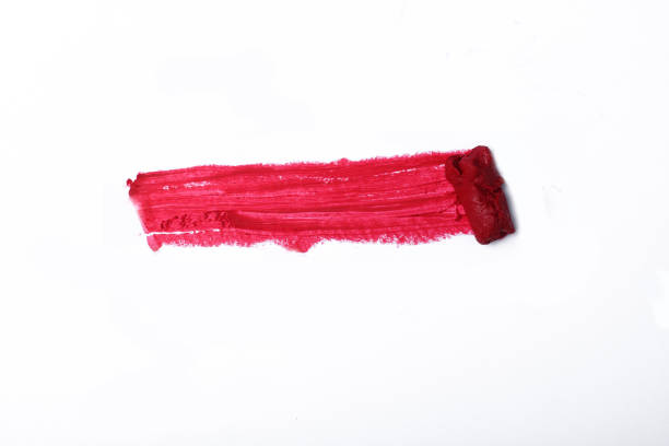 istock Lipstick smear smudge swatch isolated on white background. Cream makeup texture. Bright red color cosmetic product brush stroke swipe sample 1313455848