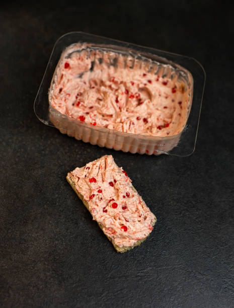 istock Plastic box with pink shrimp crab butter 1313456099