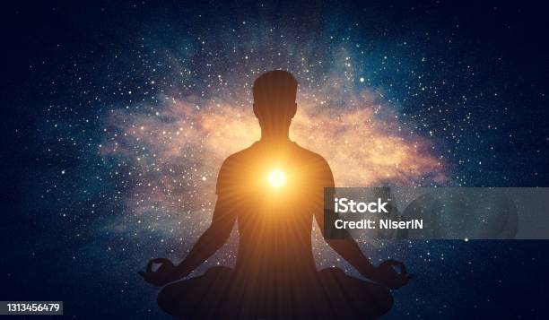 Man And Soul Yoga Lotus Pose Meditation On Nebula Galaxy Background Stock Photo - Download Image Now