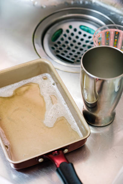istock Dirty dishes in the sink 1313458576