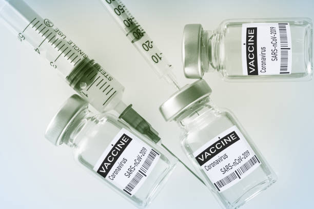 istock syringe and medicine bottle for injection 1313459482