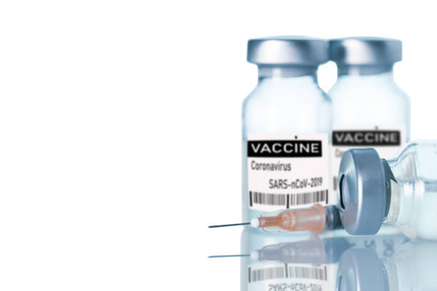 istock syringe and medicine bottle 1313459911
