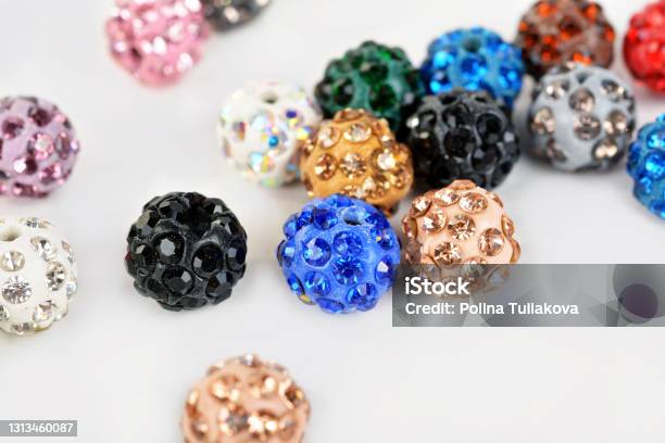 Set Of Colored Round Plastic Shambhala Beads With Glass Rhinestones Stock Photo - Download Image Now