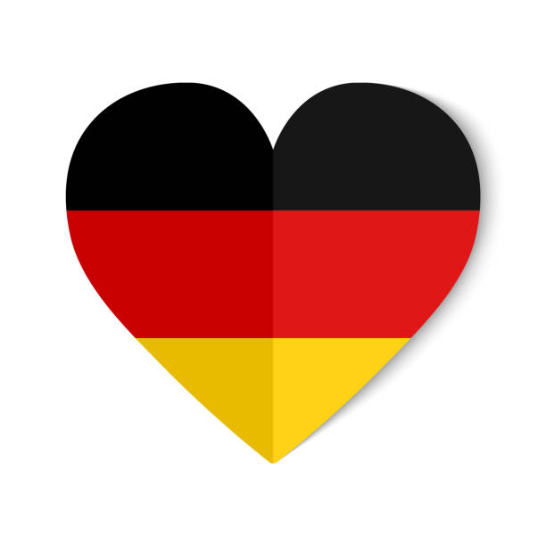 istock Germany flag with origami style on heart background 1313462471
