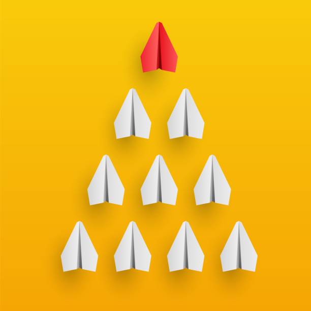 istock Individual red leader paper plane lead other. Business and leadership 1313463434