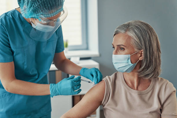 istock Female nurse in protective workwear 1313465646