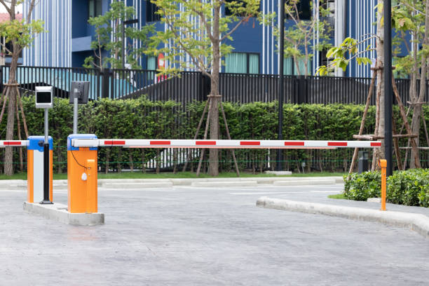 istock automatic barrier bar for home village security system with CCTV. security gate for resident. 1313465742
