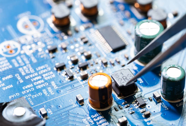 Repair Circuit Boards Repair Circuit Boards transistor stock pictures, royalty-free photos & images