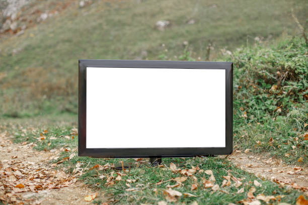 istock TV on the road with a blank screen for an inscription 1313467762