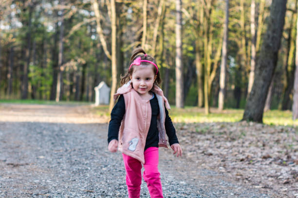 istock Girl running at the park 1313468535